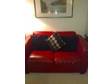 Red Reids leather suite. Consists of 1 x 2 seater and 2....
